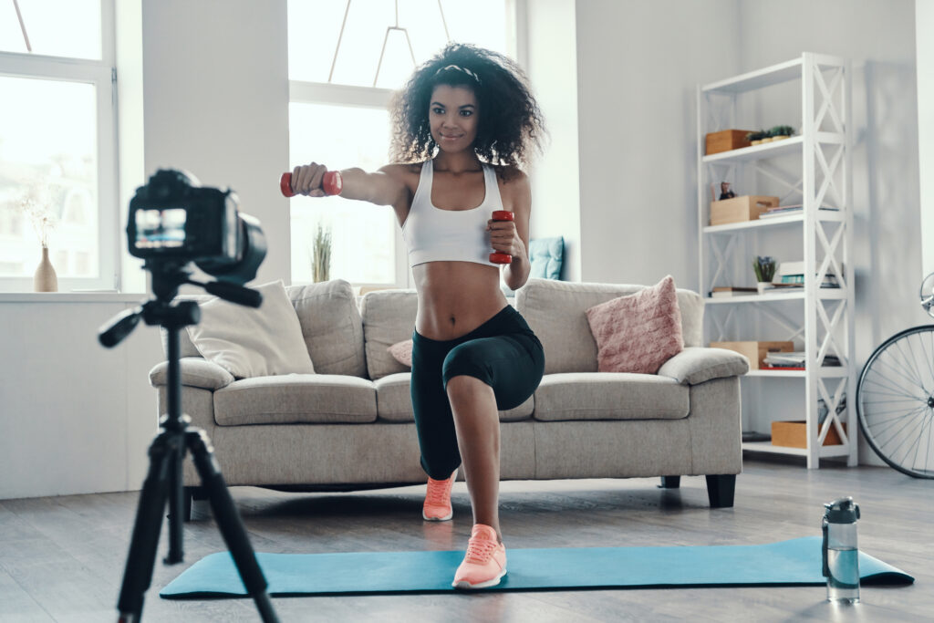 Influencer Girl Working Out And Recording It On High Quality Camera