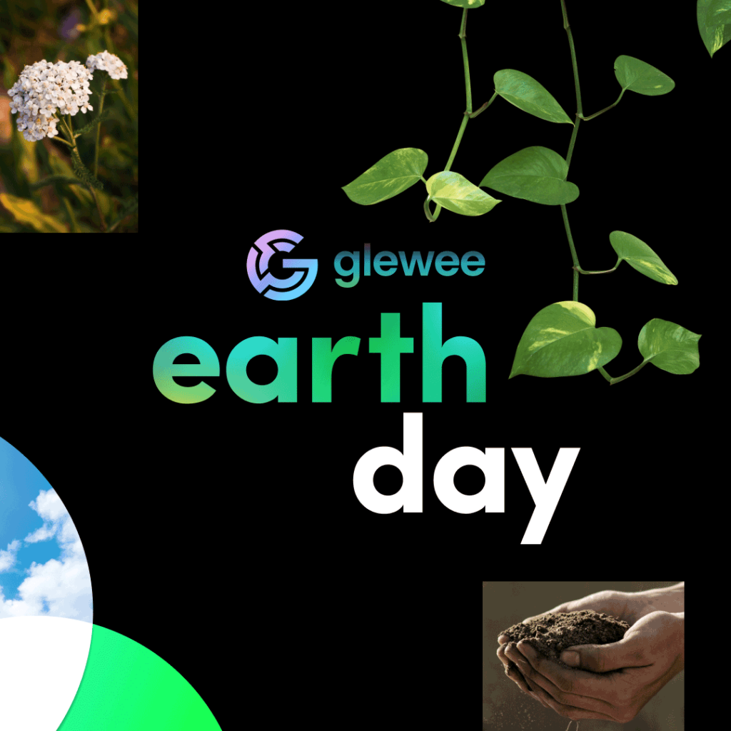 earth day with globe and logo saying earth day over black background