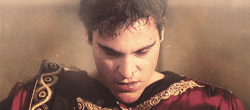 Gif of Joaquin Phoenix looking up as Commodus in the Gladiator 
